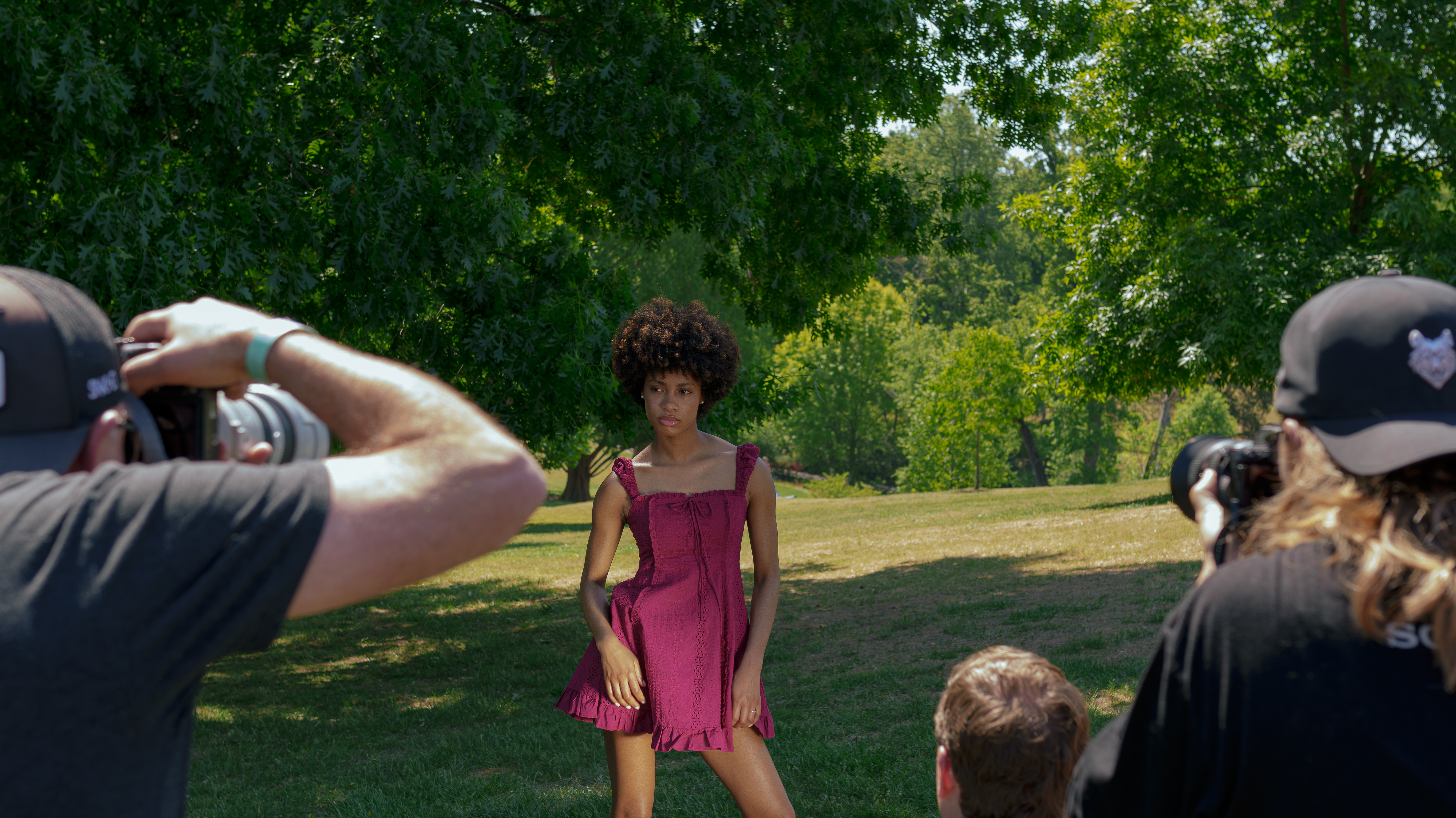 Woman wearing purple getting photographed